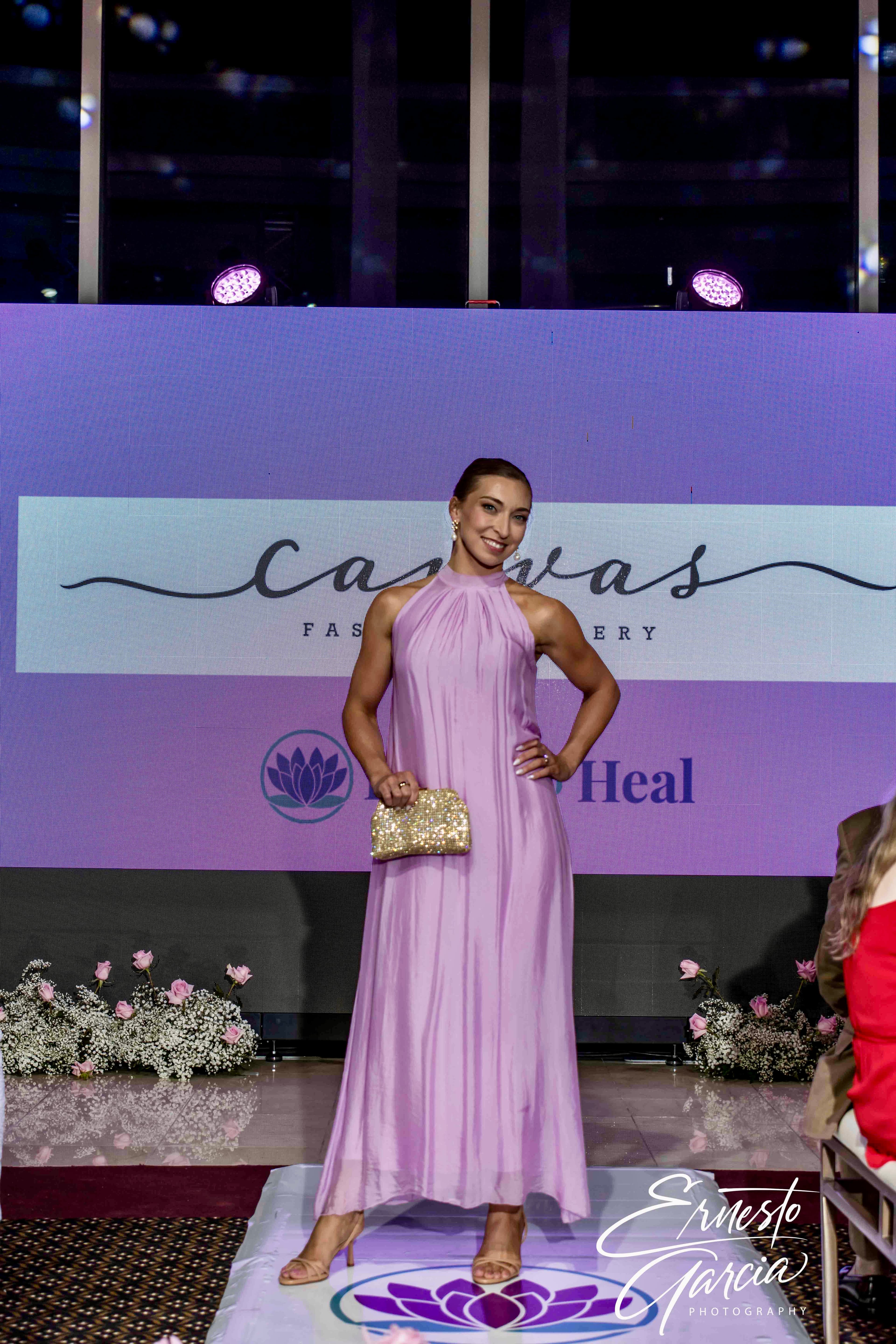 Sarah Farrell in a full-length runway look with poised movement